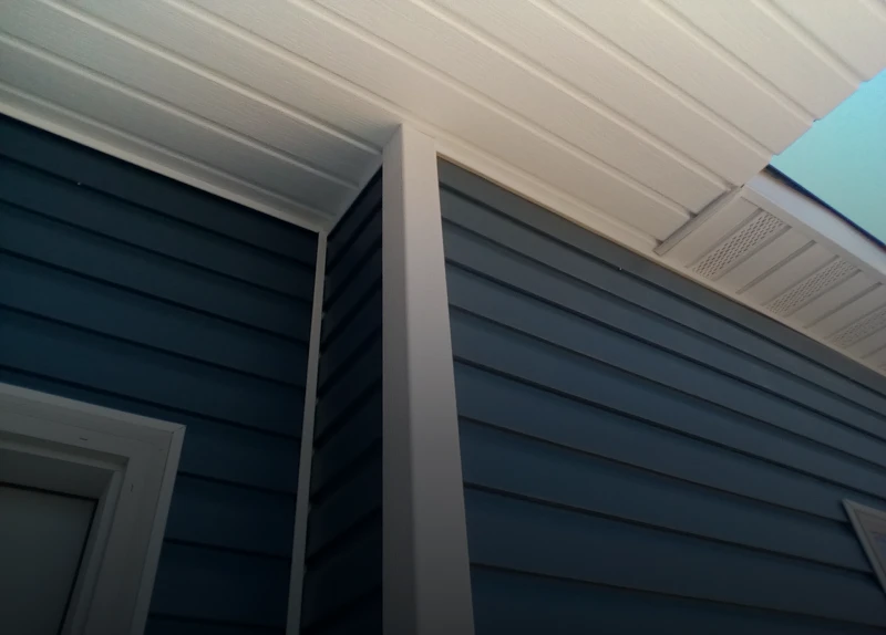 Blue siding with white soffit details