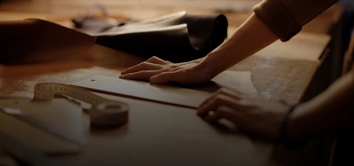 Measuring tape and fabric on table